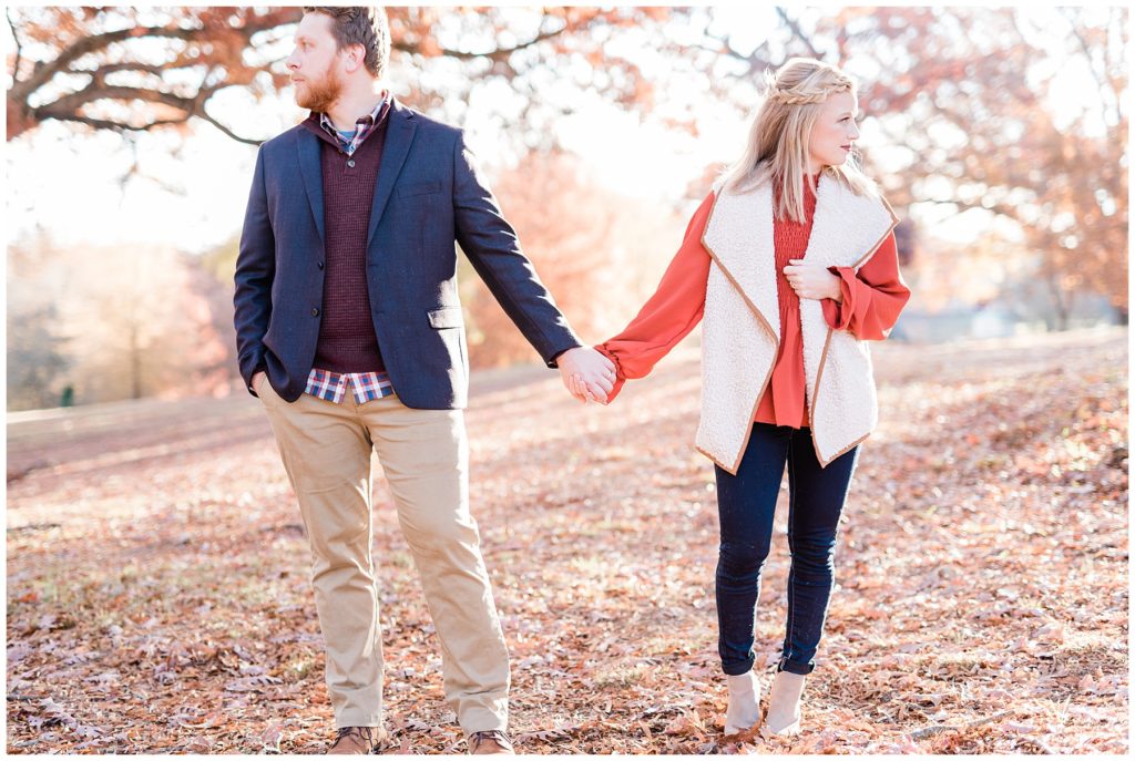 Radic Family Downtown Raleigh Fall Sunrise Photoshoot Couple Holding Hands